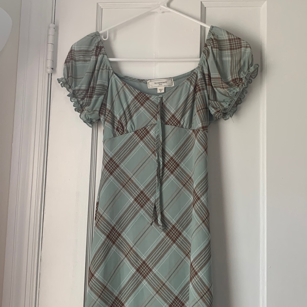 Woman’s green and brown midi dress